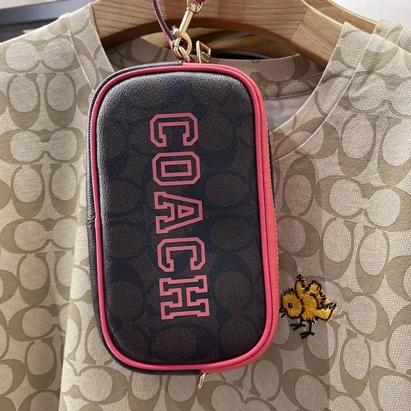 Coach Jamie Wristlet In Signature Canvas With Varsity Motif
IM/Brown/Watermelon - Picture 15 of 16